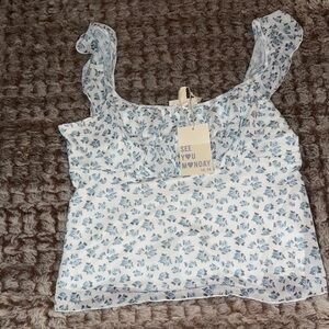 See You Monday Blue Ruffled Sleeveless Blouse